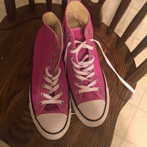 Hot pink high top converse sneakers